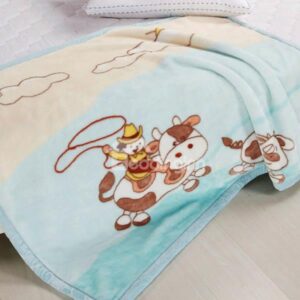 Lovely Boy on A Cow Print Flannel Baby Blanket